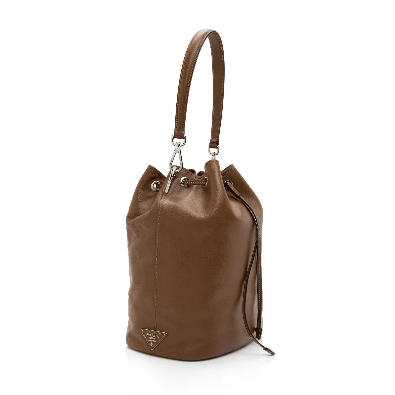 Prada Galleria bags with a structured silhouette for a professional lookPrada Calfskin Drawstring Medium Bucket Bag (SHF-RUKaHy)