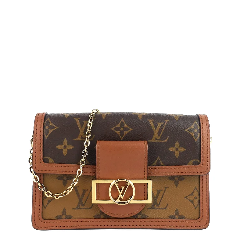 Louis Vuitton Twist bags with a crystal - embellished LV - turnlockDauphine Chain Wallet Reverse Monogram Bag