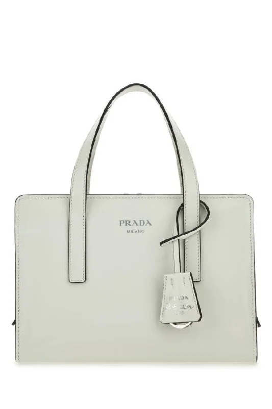 Prada handbags with a metal - framed clasp for durability and stylePrada Women Ivory Leather Re-Edition 1995 Handbag