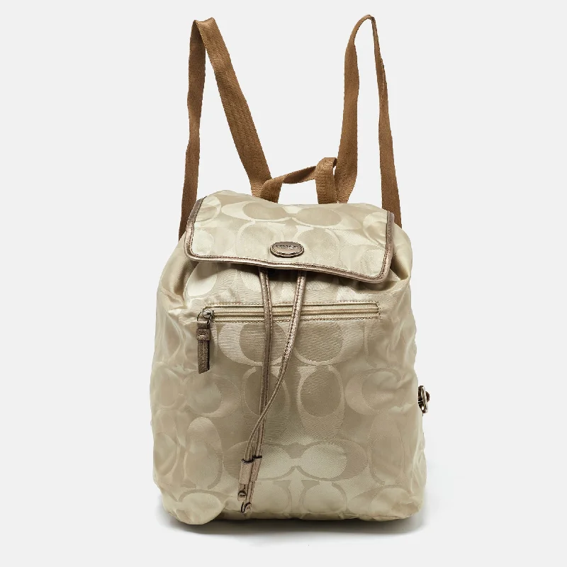 Water-resistant travel backpacksBeige/Metallic Signature Nylon and Leather Backpack