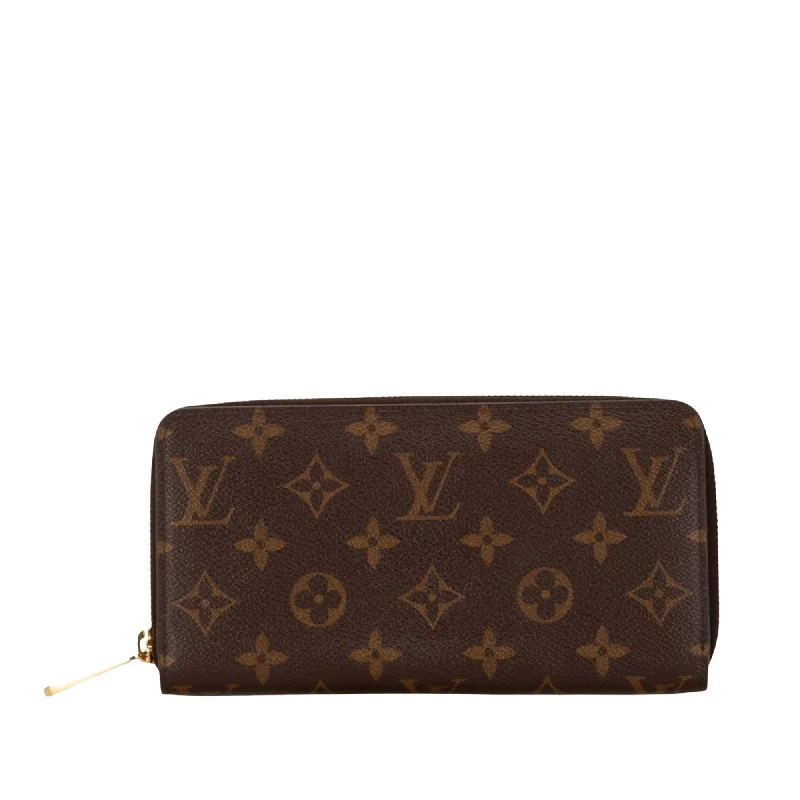 Ladies Louis Vuitton Petite Malle bags with a star - shaped charm for cutenessLOUIS VUITTON Zippy wallet