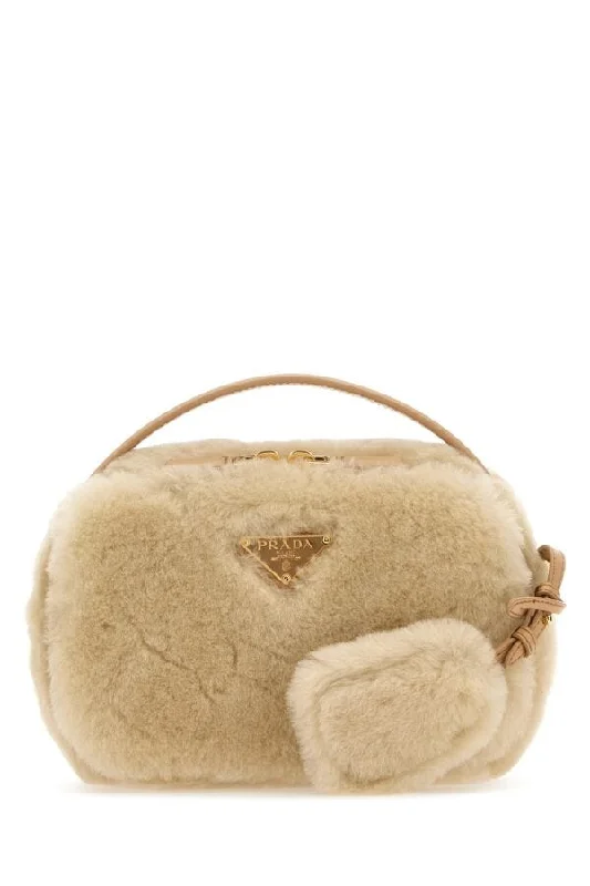 Prada Cahier bags with a detachable shoulder strap for versatile carryingPrada Women Sand Shearling Crossbody Bag