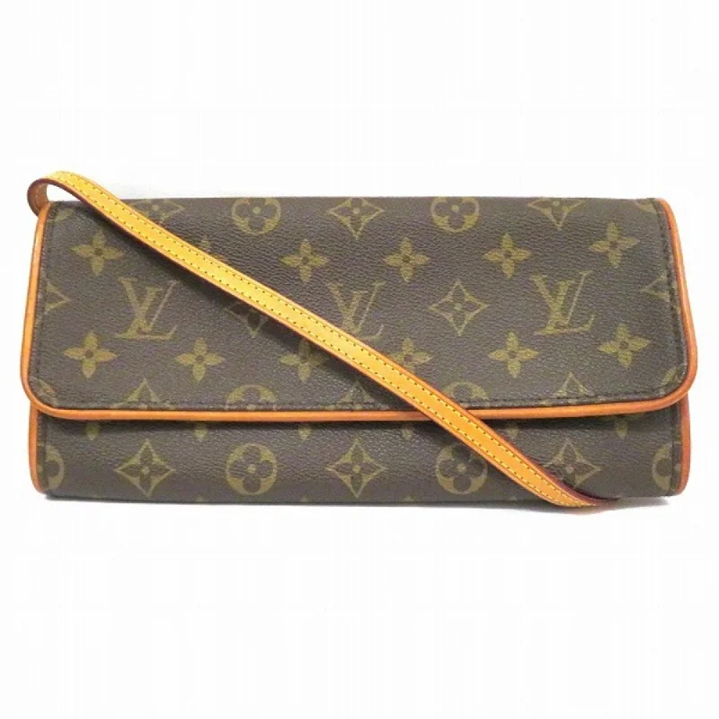 Louis Vuitton bags with a front - flap pocket for quick - access itemsLOUIS VUITTON Twin Clutch Bag