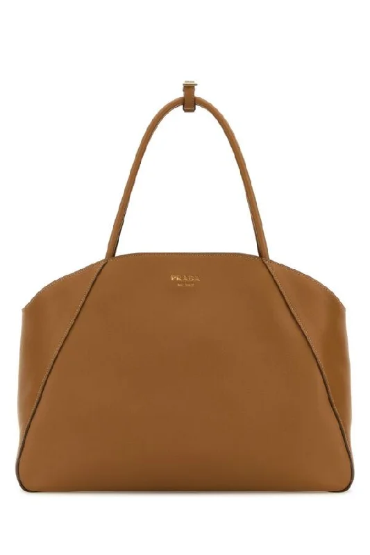 Prada bags with a zip - top closure and multiple interior pockets for organizationPrada Women Caramel Leather Shopping Bag