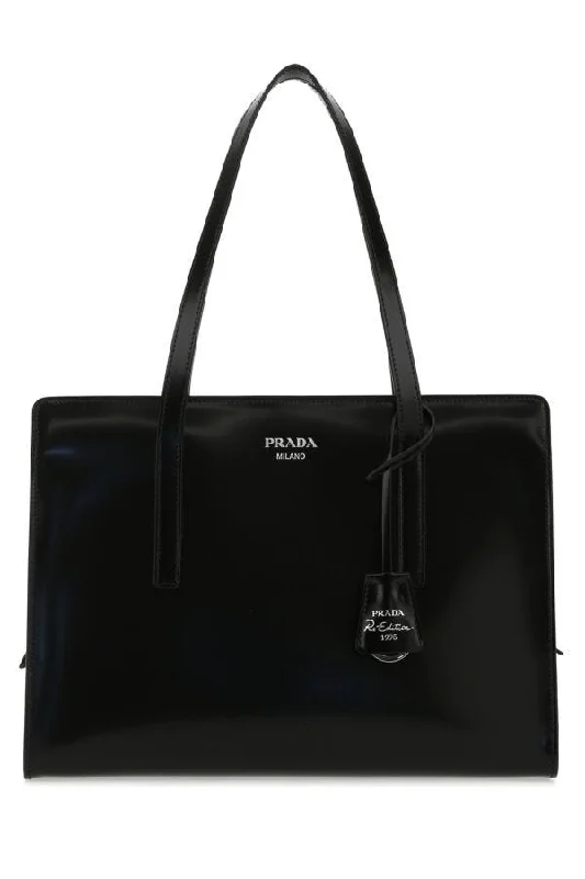 Prada tote bags with a printed Prada logo on the front for brand visibilityPrada Women Black Leather Re-Edition 1995 Shoulder Bag