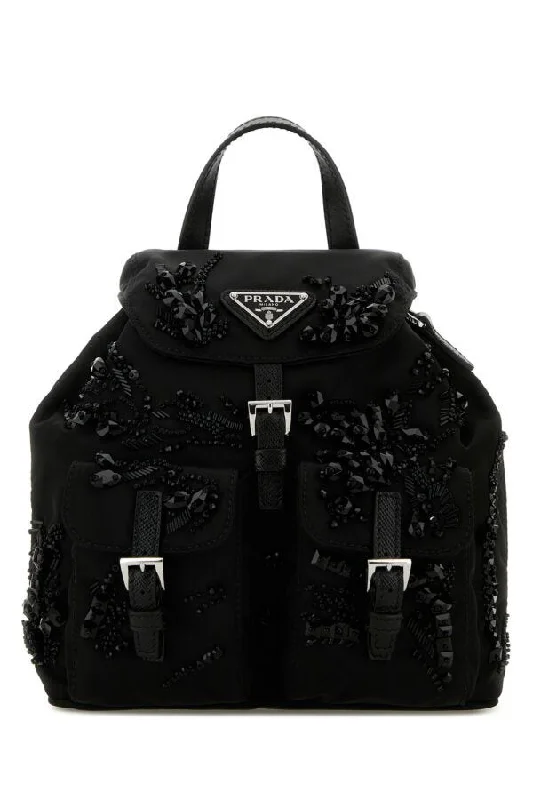 Prada Cahier bags with a monogram - embossed leather surfacePrada Women Black Nylon Mini Backpack