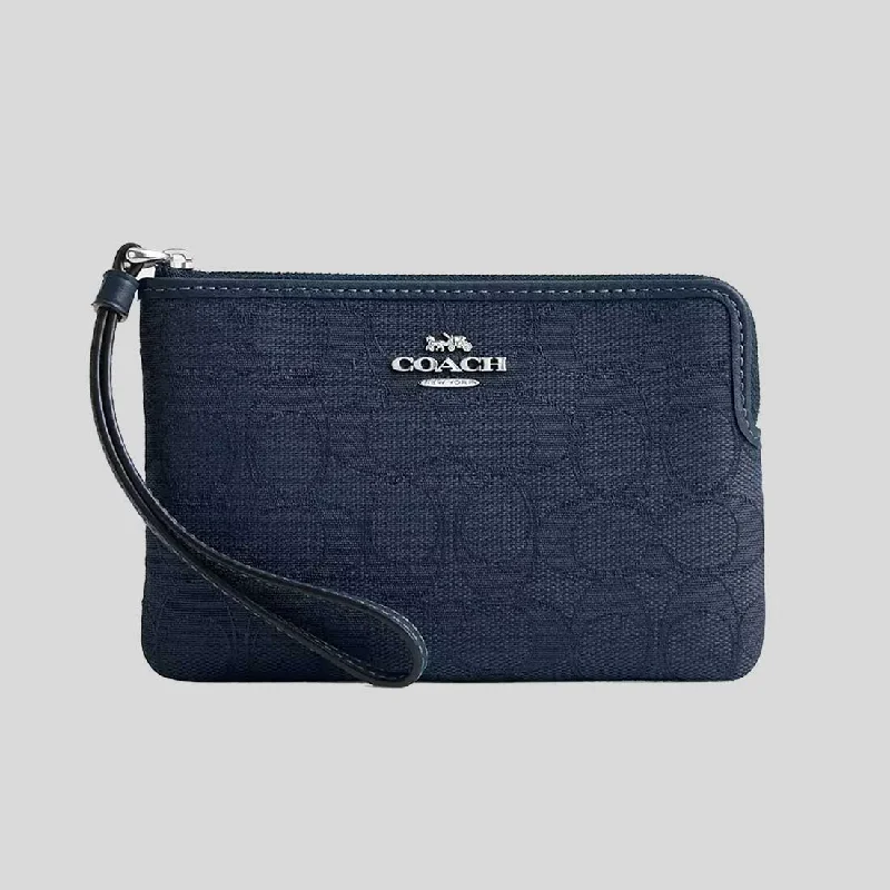 Crossbody bags for everyday useCOACH Corner Zip Wristlet In Signature Jacquard Dark Denim CW862