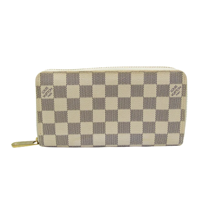 Louis Vuitton Twist bags with a crystal - embellished LV - turnlockLOUIS VUITTON Zippy wallet