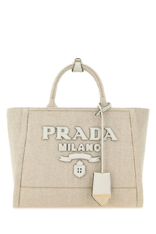 Prada Re - Edizione 2005 bags with a retro - inspired designPrada Women Sand Canvas Shopping Bag