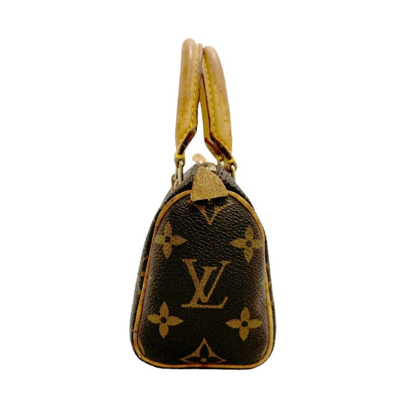 Louis Vuitton crossbody bags with a woven leather strap for textureLOUIS VUITTON Mini speedy Handbag