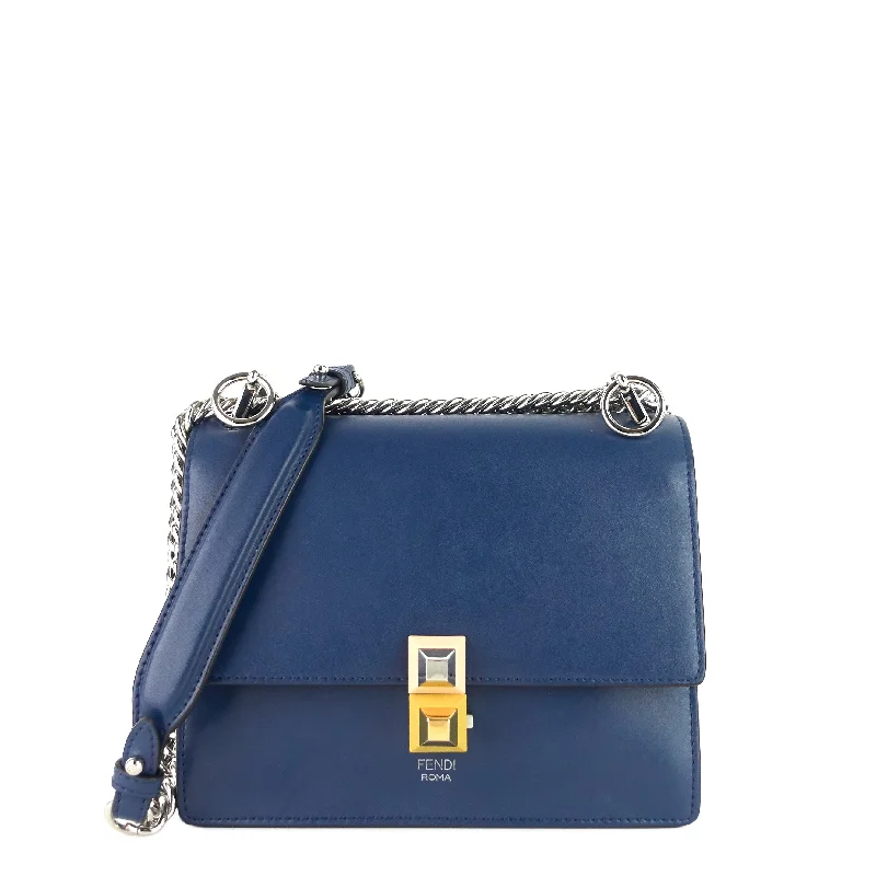 Fendi Baguette bags featuring the iconic FF logo plaque for a branded lookKan I Small Calfskin Leather Bag