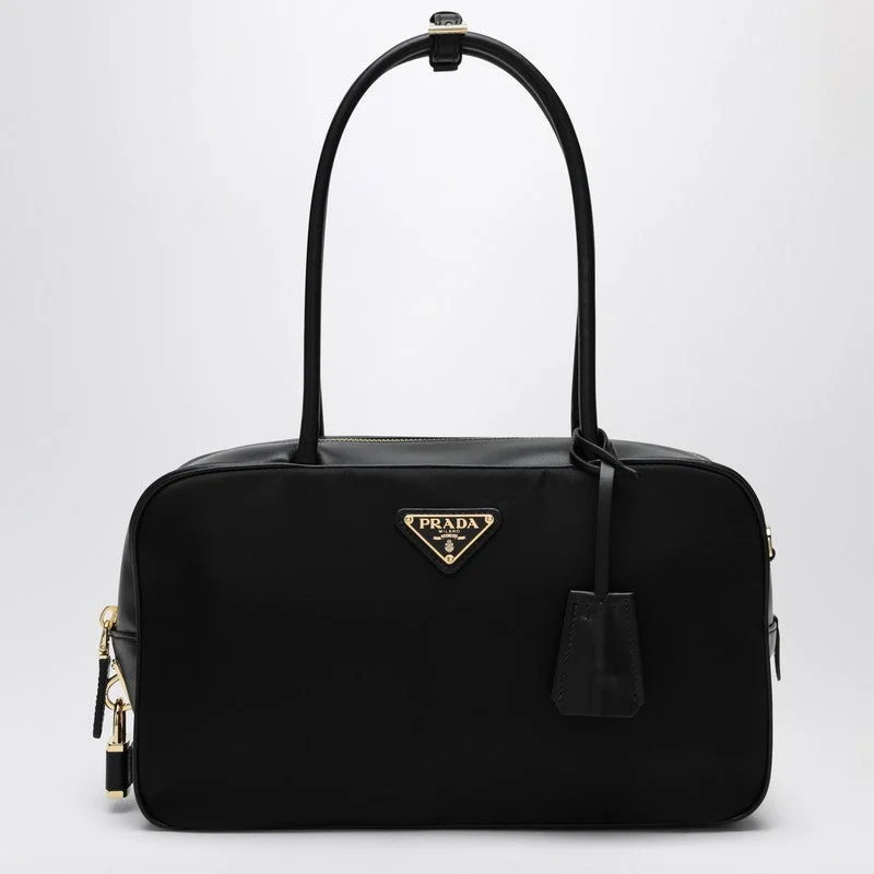 Prada Cleo bags with a contrast - colored interior for visual interestPrada Black Medium Top-Handle In Re-Nylon And Leather Women