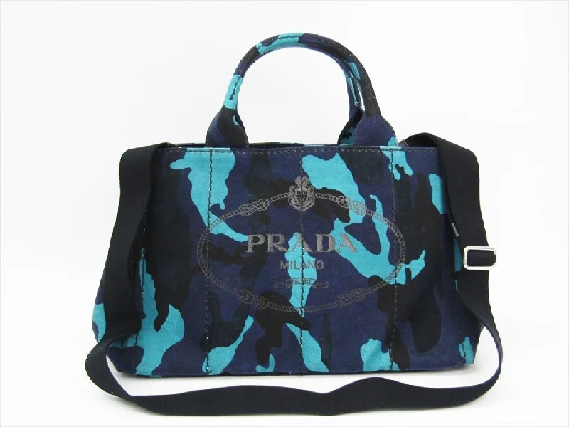 Prada Cahier bags with a monogram - embossed leather surfacePrada Camouflage Denim Canapa Tote (SHA-11665)