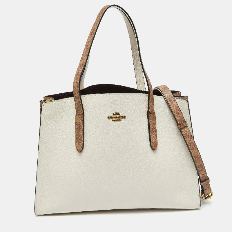 Best bags for weekend getawaysWhite/Brown Leather and Signature Coated Canvas Charlie Carryall Tote