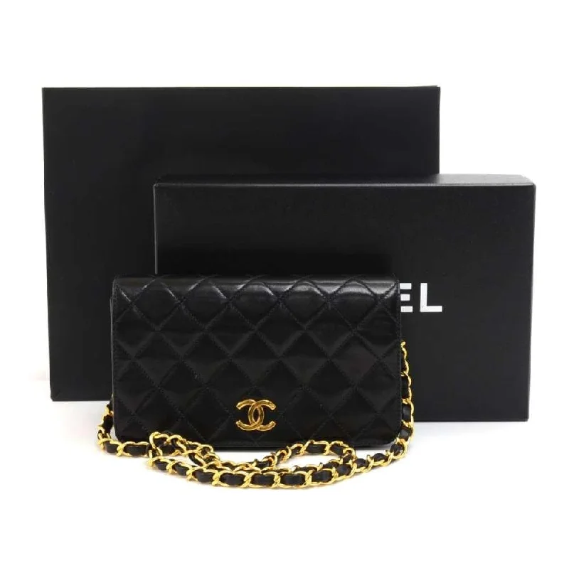 Chanel bags with leather and tweed combinationsQuilted Lambskin Leather Bag