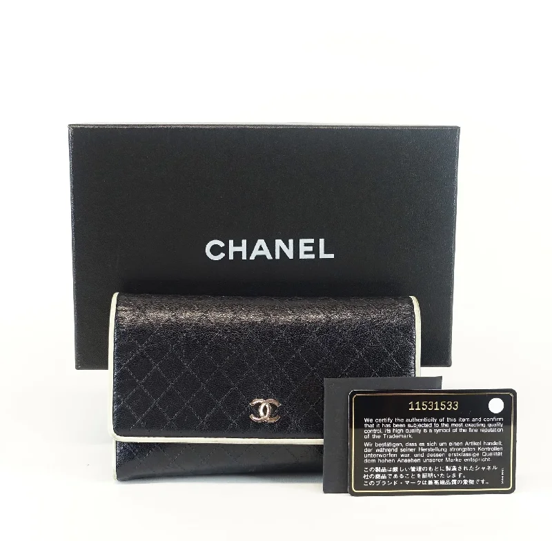 Chanel bags available at online luxury retaileQuilted Caviar Leather Wallet