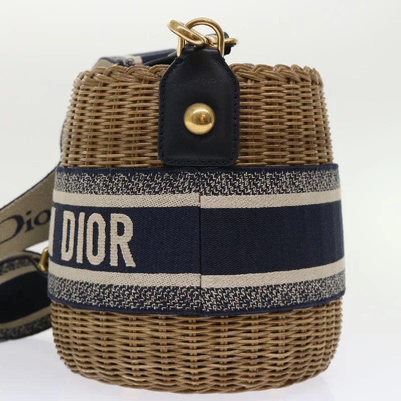 Christian Dior Saddle bags with a patent leather finish for a shiny lookCHRISTIAN DIOR Basket Bag Trotter Canvas Shoulder Bag Rattan Blue Auth 51270A