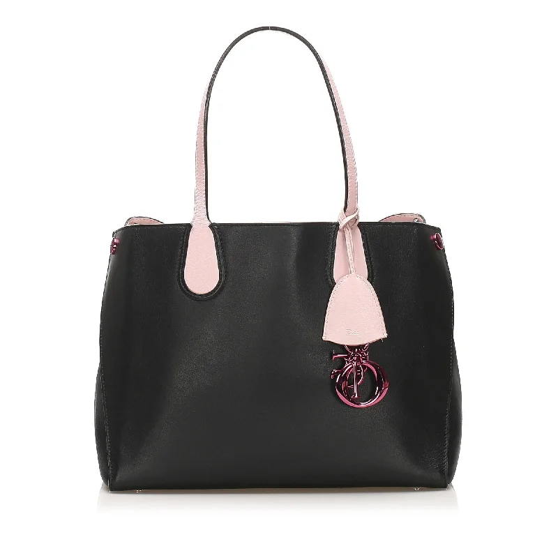 Christian Dior backpacks with a sleek, minimalist silhouetteDior Addict Leather Tote Bag (SHG-13760)