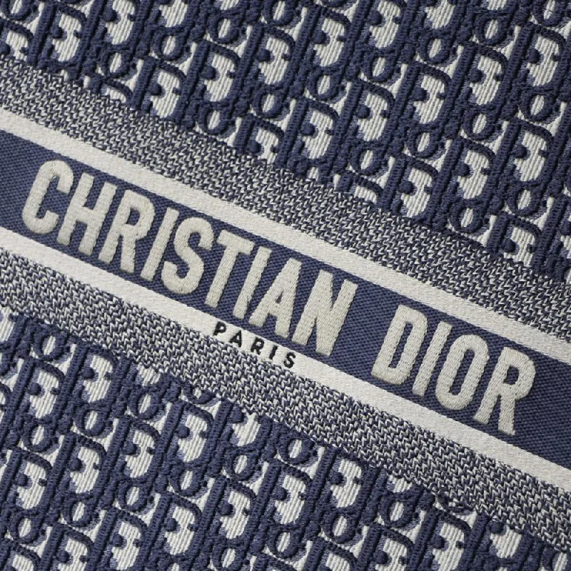 Christian Dior bags with a side - pocket for holding a water bottleDIOR BOOK TOTE